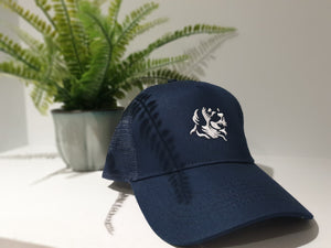 Snapback trucker's cap in navy with The Cally Collection logo in white.