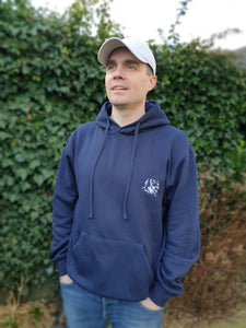 Photo of man wearing a navy hoody with The Cally Collection logo in white in the top left corner.   The man is also wearing a light grey air mesh cap with The Cally Collection logo in white on the front panel.